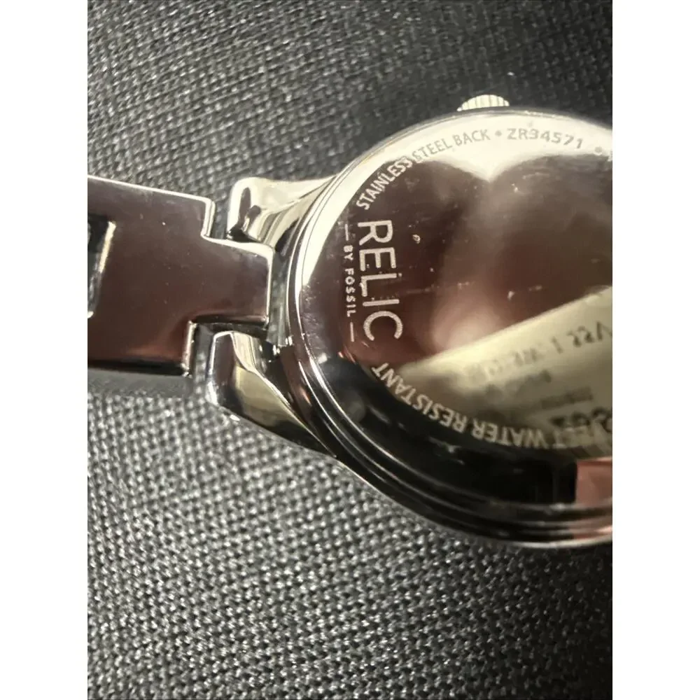 NEW RELIC BY FOSSIL ZR-34571 RUNNING PERFECTLY WITH TAGS STILL ON IT!! (B10)